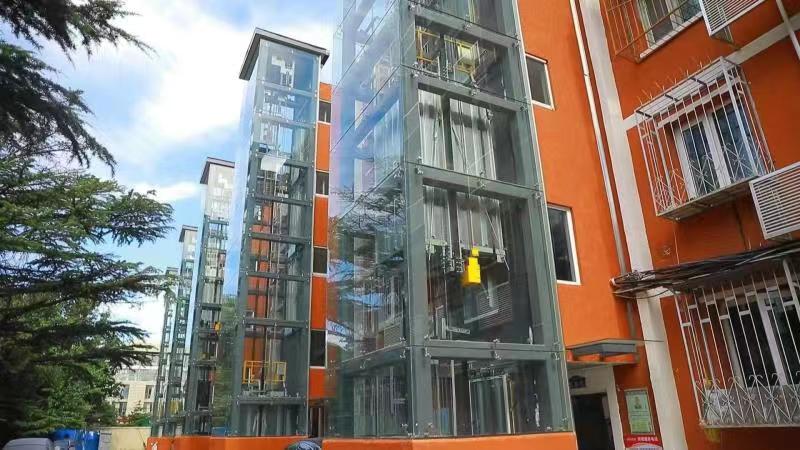 海淀区西三旗街道冶金研究院社区安装外置电梯方便居民出行