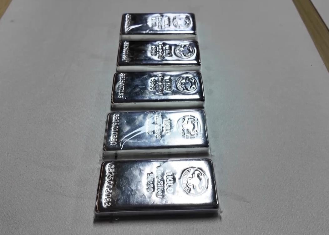 国际银价首次突破每盎司80美元_京报网